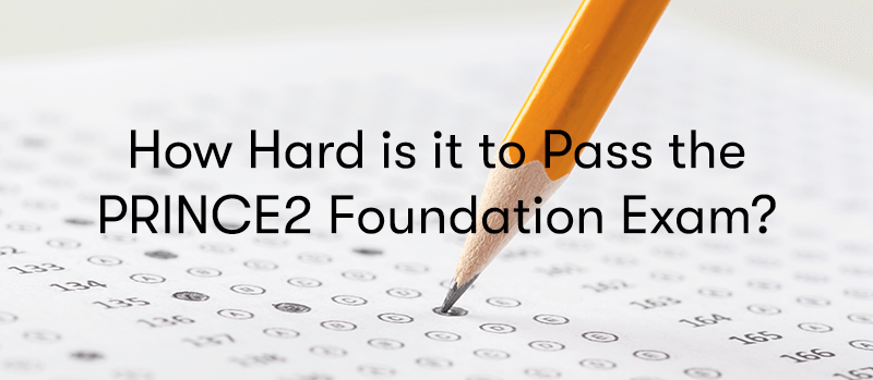 How Hard is it to Pass the PRINCE2 Foundation Exam? text in front of a pencil filling out exam questions on paper
