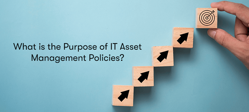 A picture of blocks of wood with arrows on them pointing towards a block with a target on it on the right. With the heading 'What is the Purpose of IT Asset Management Policies?' on the left. On a blue background.