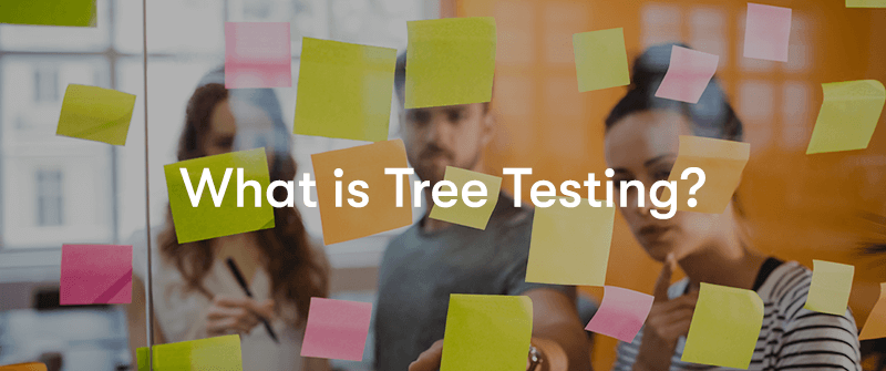 What is tree testing? text in front of post-it notes on a glass wall with people looking at them