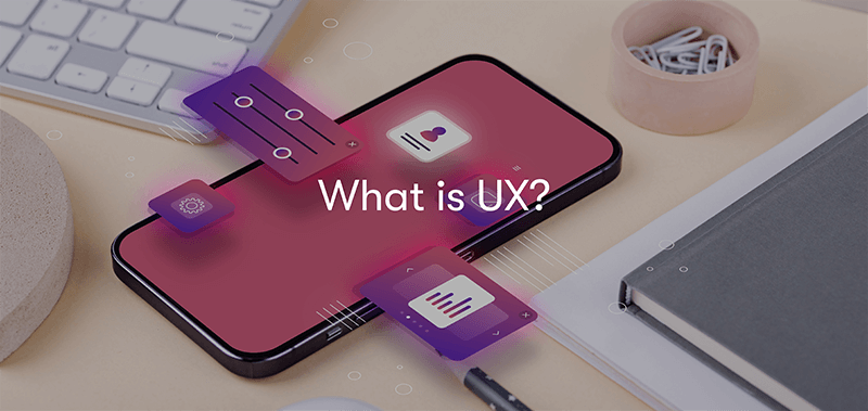 What is UX? text in front of a phone with elements of UX connected to it by lines on a dark background.