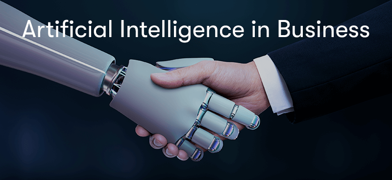 A business man shaking hands with a robot hand, with the words Artificial Intelligence in Business in front.